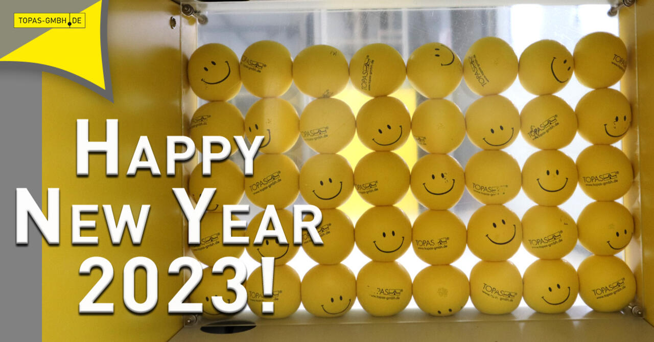 Topas smiley balls with New Year greeting