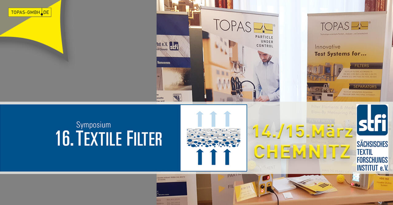 Topas-Stand mit Postern und produkten auf dem 16. Filter-Symposium in Chemnitz mit Logo Veranstalter und Datum