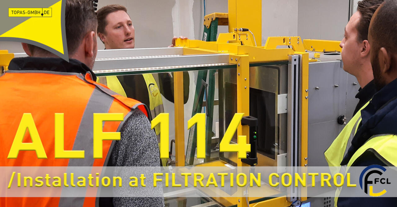 Luftfilterpüfsystem ALF 114 umgeben von Arbeitern zur Installation in UK